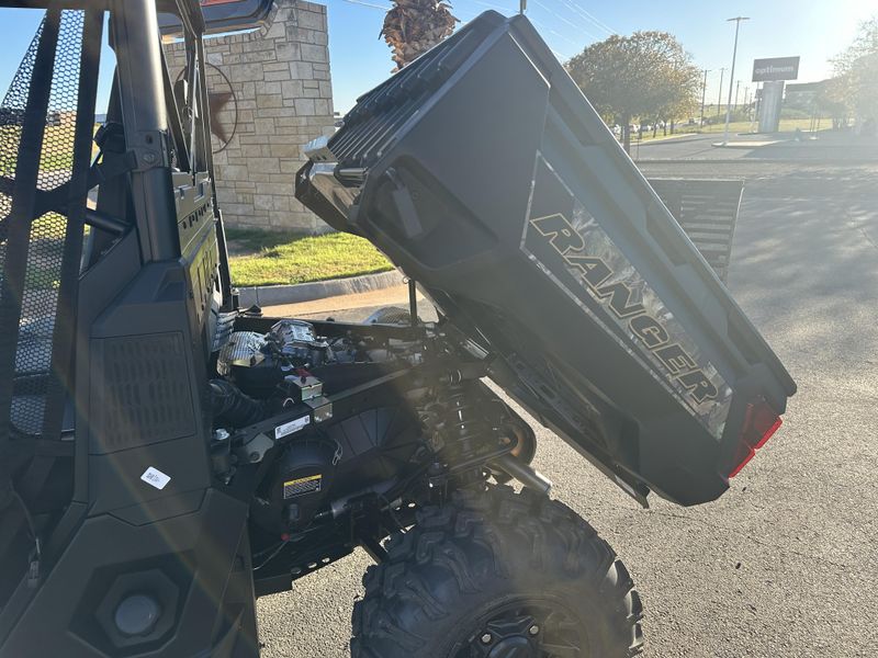 2025 POLARIS RANGER CREW 1000 PREMIUM PURSUIT CAMO in a POLARIS PURSUIT CAMO exterior color. Family PowerSports (877) 886-1997 familypowersports.com 