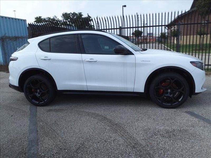 2024 Alfa Romeo Stelvio Veloce in a Alfa White exterior color and Blackinterior. Northside Imports Houston 281-475-4549 northsideimportshouston.com 