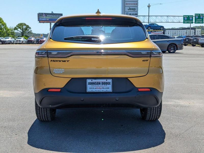 2023 Dodge Hornet Gt Awd in a Acapulco Gold exterior color and Blackinterior. Johnson Dodge 601-693-6343 pixelmotiondemo.com 