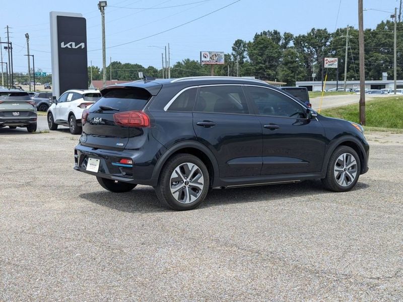 2022 Kia Niro EV EX Premium in a Gravity Blue exterior color and Charcoalinterior. Johnson Dodge 601-693-6343 pixelmotiondemo.com 