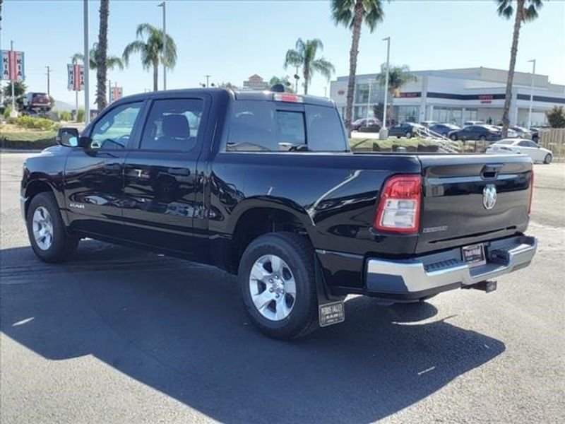 2024 RAM 1500 Big Horn Lone Star in a Diamond Black Crystal Pearl Coat exterior color and Blackinterior. Perris Valley Auto Center 951-657-6100 perrisvalleyautocenter.com 