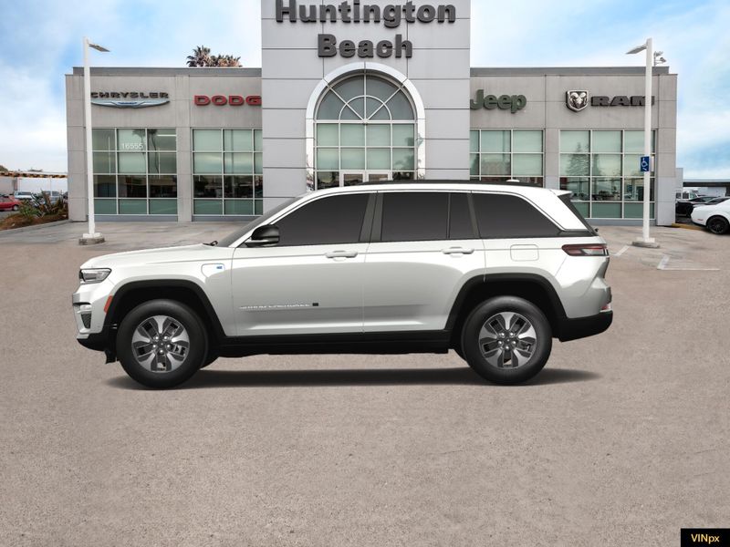 2023 Jeep Grand Cherokee 4xe Base 4x4 in a Bright White exterior color and Global Blackinterior. BEACH BLVD OF CARS beachblvdofcars.com 
