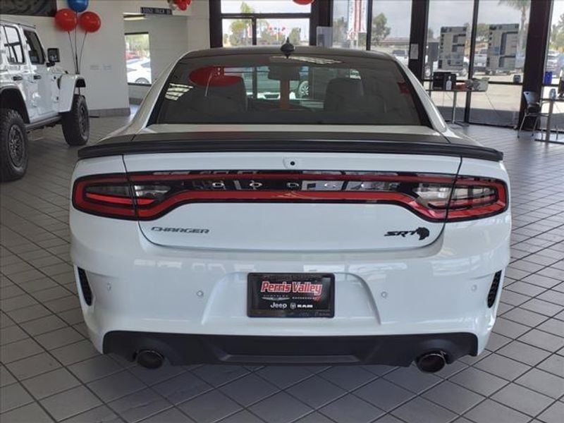 2023 Dodge Charger SRT Hellcat Widebody in a White Knuckle Clear Coat exterior color and Blackinterior. Perris Valley Auto Center 951-657-6100 perrisvalleyautocenter.com 