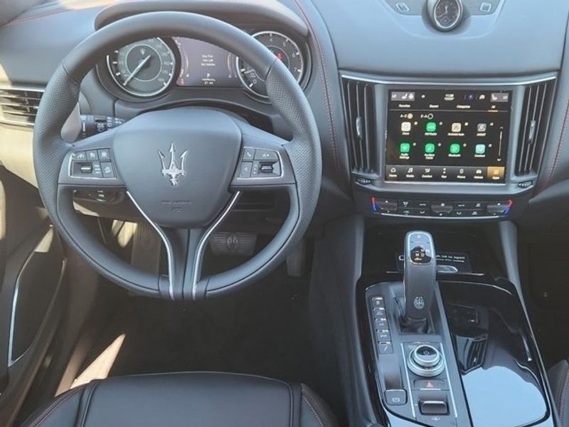 2024 Maserati Levante Modena in a Grey exterior color and Black/Redinterior. Northside Imports Houston 281-475-4549 northsideimportshouston.com 