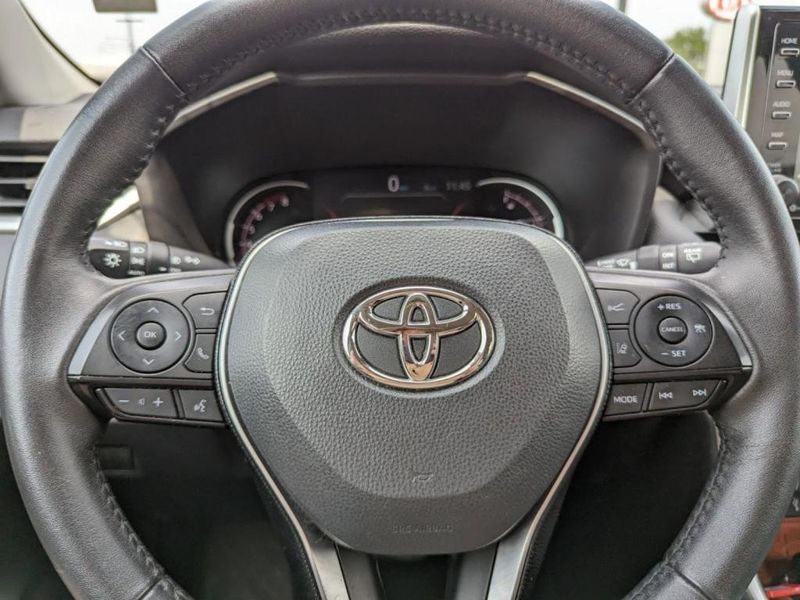 2021 Toyota RAV4 Adventure in a Midnight Black Metallic exterior color. Johnson Dodge 601-693-6343 pixelmotiondemo.com 