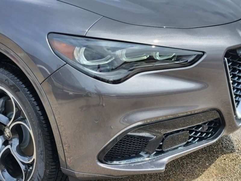 2024 Alfa Romeo Stelvio Ti Awd in a Vesuvio Gray Metallic exterior color and Blackinterior. Northside Alfa Romeo of Houston 281-475-4549 alfaromeousaofnorthhouston.com 