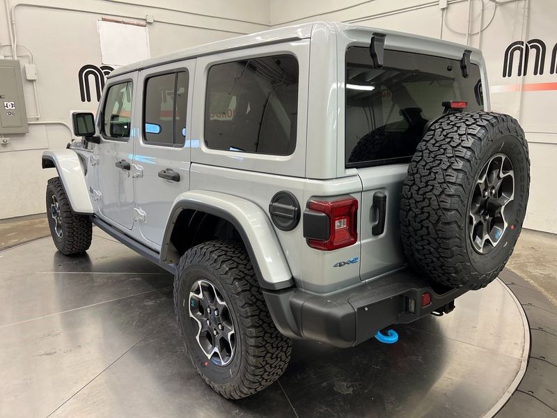 2023 Jeep Wrangler Rubicon 4xe in a Silver Zynith Clear Coat exterior color and Blackinterior. Marina Auto Group (855) 564-8688 marinaautogroup.com 