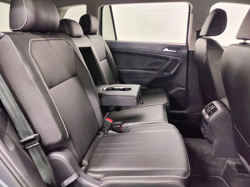 2023 Volkswagen Tiguan SE 7 Passenger Seating in a Platinum Gray Metallic exterior color and Black Heated Seatsinterior. Schmelz Countryside Alfa Romeo and Fiat (651) 968-0556 schmelzfiat.com 