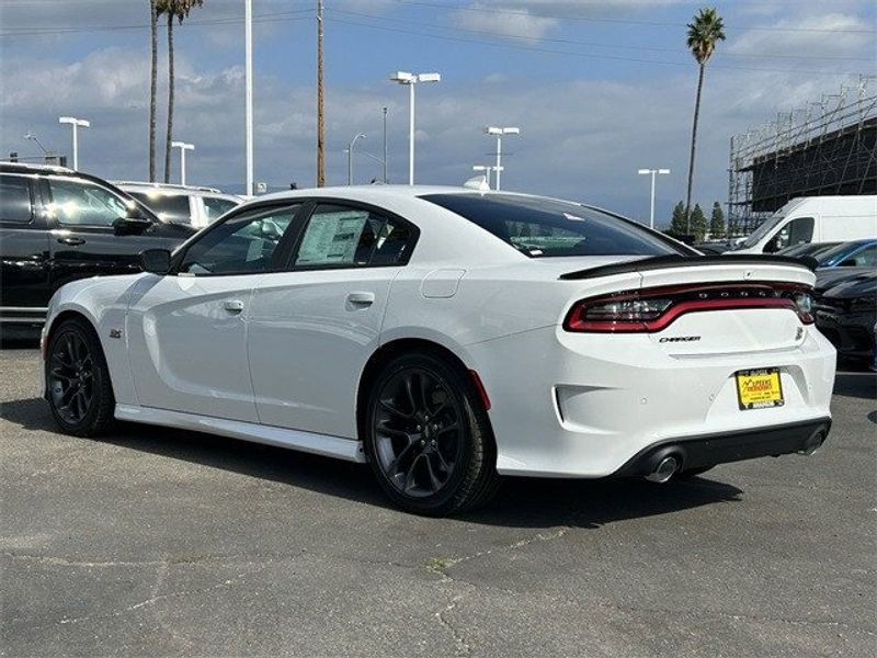 2023 Dodge Charger Scat Pack in a White Knuckle exterior color and Blackinterior. McPeek