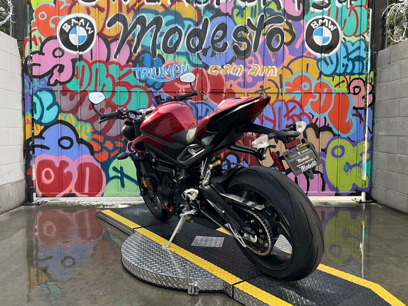 2024 Triumph STREET TRIPLE RS in a CARNIVAL RED exterior color. BMW Motorcycles of Modesto 209-524-2955 bmwmotorcyclesofmodesto.com 