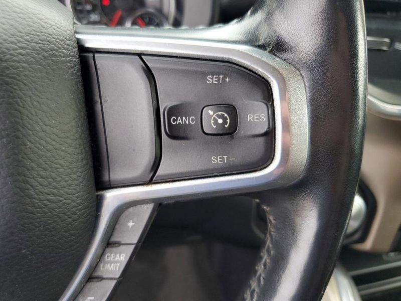 2020 RAM 1500 Laramie in a Bright White Clear Coat exterior color and Blackinterior. Johnson Dodge 601-693-6343 pixelmotiondemo.com 