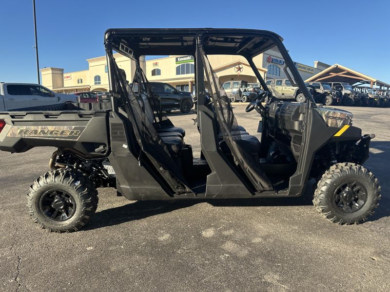 2025 POLARIS RANGER CREW 1000 PREMIUM PURSUIT CAMO in a POLARIS PURSUIT CAMO exterior color. Family PowerSports (877) 886-1997 familypowersports.com 