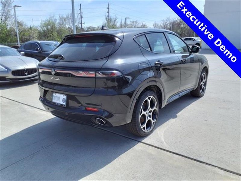 2024 Alfa Romeo Tonale Veloce Eawd in a Alfa Black exterior color and Red/Blackinterior. Northside Alfa Romeo of Houston 281-475-4549 alfaromeousaofnorthhouston.com 