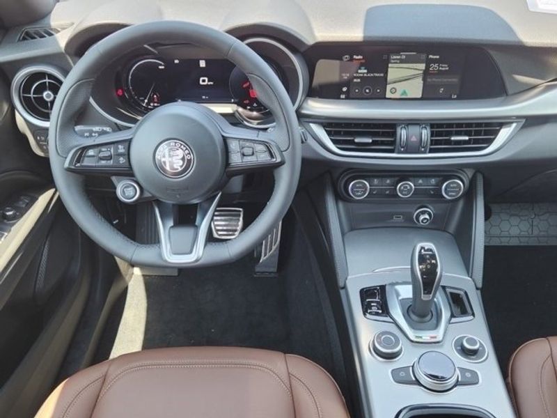 2024 Alfa Romeo Stelvio Ti in a Vulcano Black Metallic exterior color and Blackinterior. Northside Imports Houston 281-475-4549 northsideimportshouston.com 