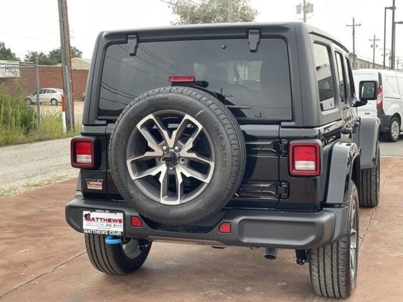 2024 Jeep Wrangler 4-door Sport S 4xe in a Black Clear Coat exterior color and Blackinterior. Matthews Chrysler Dodge Jeep Ram 918-276-8729 cyclespecialties.com 