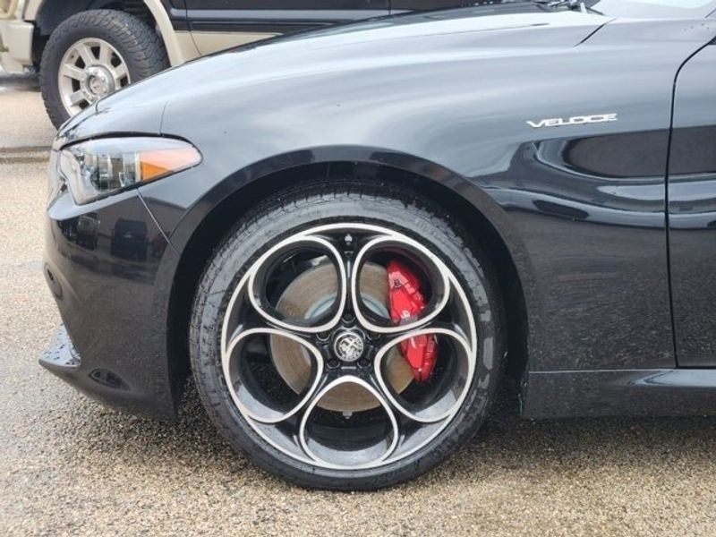 2024 Alfa Romeo Giulia Veloce in a Vulcano Black Metallic exterior color and Blackinterior. Northside Imports Houston 281-475-4549 northsideimportshouston.com 