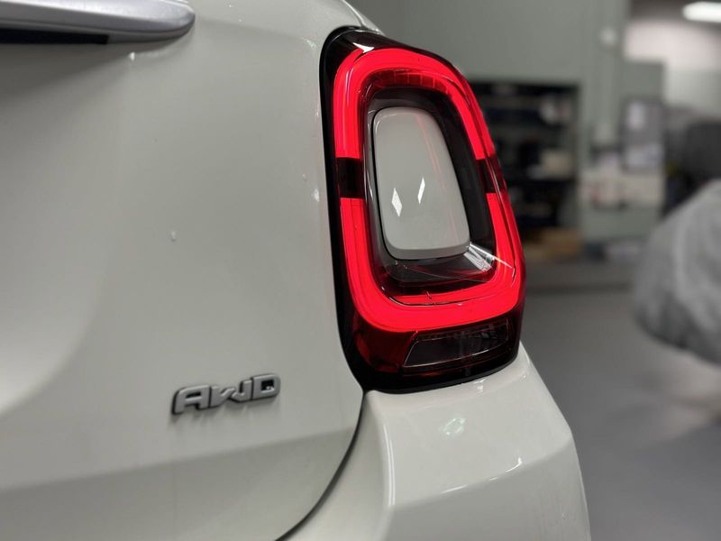 2023 Fiat 500x Pop Awd in a Bianco Gelato (White Clear Coat) exterior color and Blackinterior. Schmelz Countryside Alfa Romeo and Fiat (651) 968-0556 schmelzfiat.com 