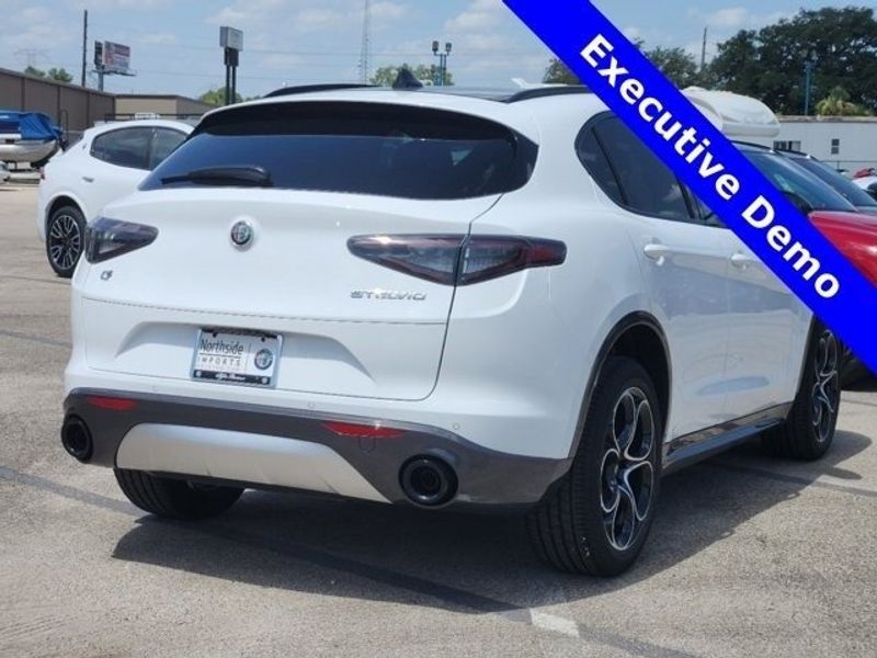 2024 Alfa Romeo Stelvio Ti in a Alfa White exterior color and Blackinterior. Northside Imports Houston 281-475-4549 northsideimportshouston.com 