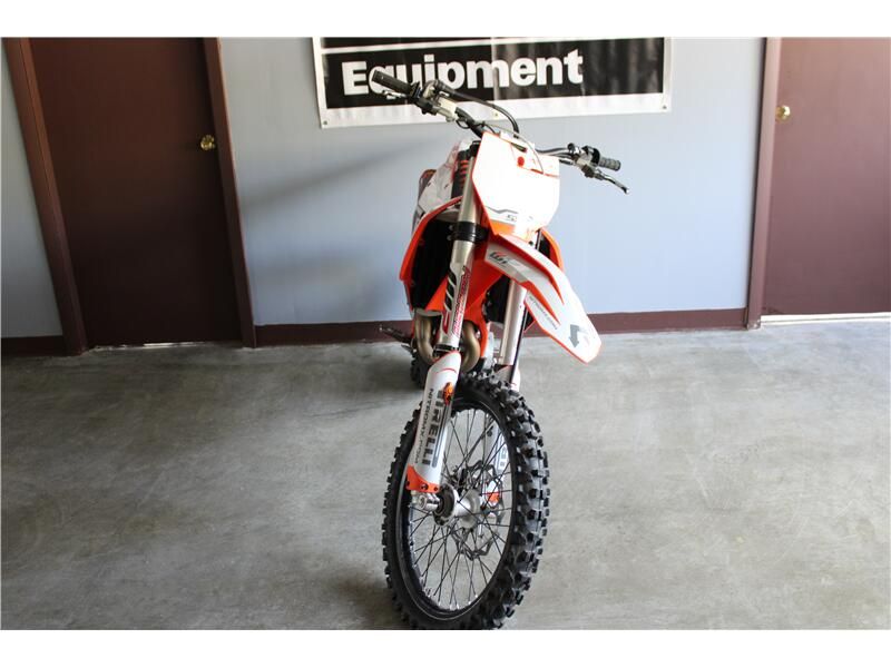 2018 KTM SX 450 F in a Orange exterior color. New England Powersports 978 338-8990 pixelmotiondemo.com 