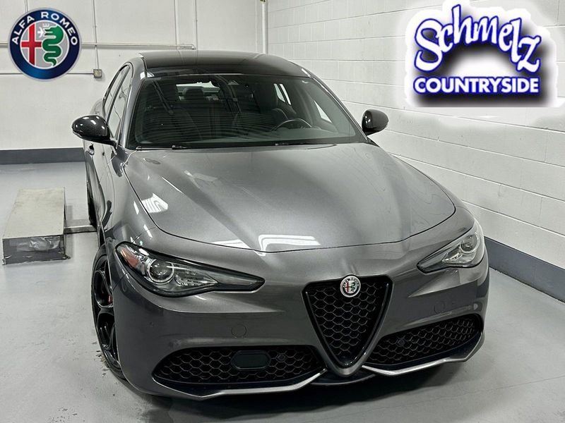 2021 Alfa Romeo Giulia Ti Sport Nero AWD w/Sunroof & Nav in a Vesuvio Gray Metallic exterior color and Black Heated Sport Leatherinterior. Schmelz Countryside Alfa Romeo and Fiat (651) 968-0556 schmelzfiat.com 