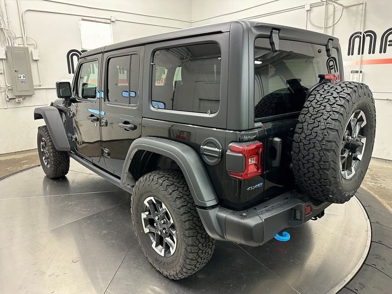 2024 Jeep Wrangler 4-door Rubicon 4xe in a Black Clear Coat exterior color and Blackinterior. Marina Auto Group (855) 564-8688 marinaautogroup.com 