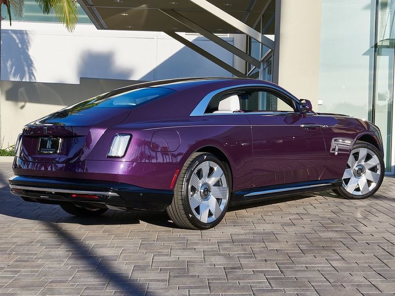 2024 Rolls-Royce Spectre  in a Twilight Purple exterior color and Arctic Whiteinterior. SHELLY AUTOMOTIVE shellyautomotive.com 