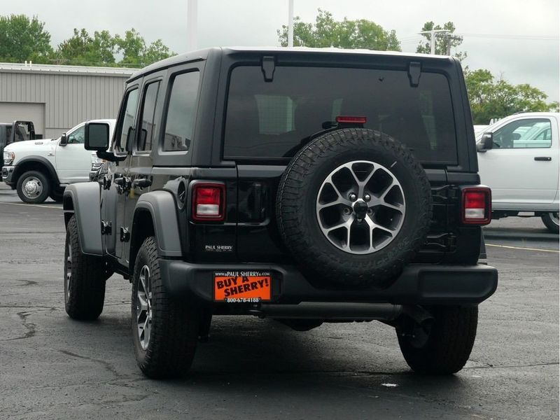 2024 Jeep Wrangler 4-door Sport S in a Black Clear Coat exterior color and Blackinterior. Paul Sherry Chrysler Dodge Jeep RAM (937) 749-7061 sherrychrysler.net 