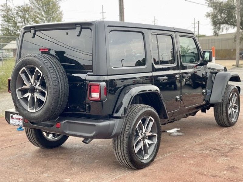 2024 Jeep Wrangler 4-door Sport S 4xe in a Black Clear Coat exterior color and Blackinterior. Matthews Chrysler Dodge Jeep Ram 918-276-8729 cyclespecialties.com 