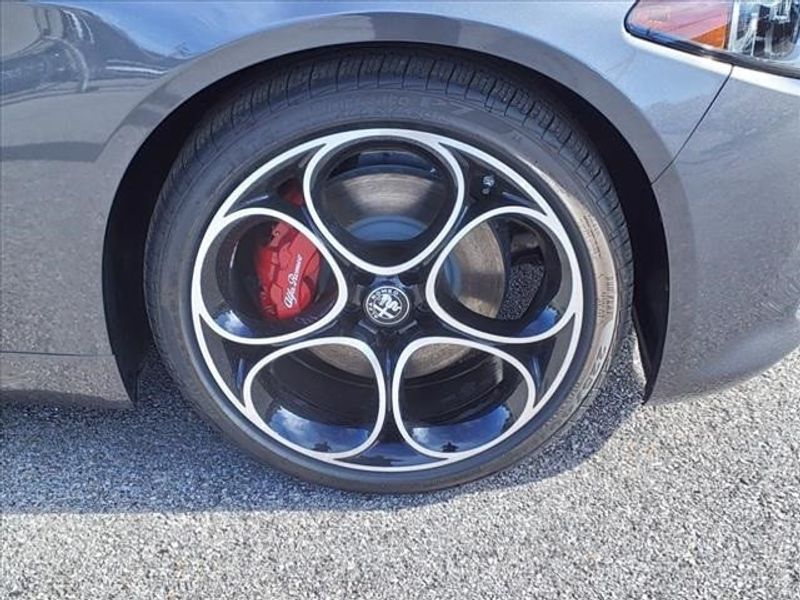 2024 Alfa Romeo Giulia Ti in a Vesuvio Gray Metallic exterior color and Blackinterior. Northside Imports Houston 281-475-4549 northsideimportshouston.com 