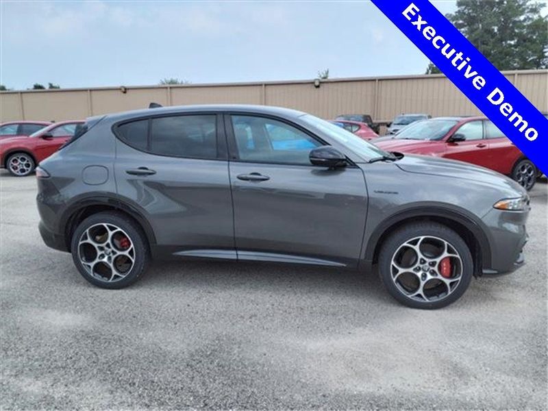 2024 Alfa Romeo Tonale Veloce in a Grigio Ascari Metallic exterior color and Red/Blackinterior. Northside Imports Houston 281-475-4549 northsideimportshouston.com 