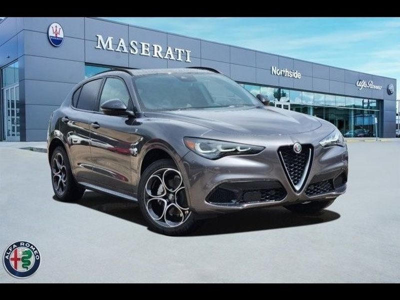 2024 Alfa Romeo Stelvio Ti Awd in a Vesuvio Gray Metallic exterior color and Blackinterior. Northside Alfa Romeo of Houston 281-475-4549 alfaromeousaofnorthhouston.com 