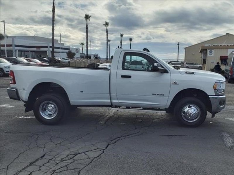 2022 RAM 3500 Tradesman in a Bright White Clear Coat exterior color and Blackinterior. Perris Valley Kia 951-657-6100 perrisvalleykia.com 