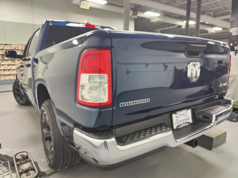 2023 RAM 1500 Big Horn Crew Cab 4x4 w/Heated Seats in a Patriot Blue Pearl Coat exterior color and Diesel Gray/Black Heated Seatsinterior. Schmelz Countryside Alfa Romeo (651) 867-3222 schmelzalfaromeo.com 