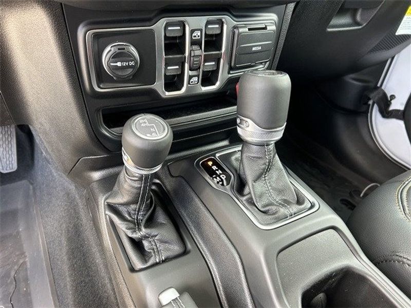 Jeep Wrangler 4xE Sahara in a Bright White Clear Coat exterior color and Blackinterior. McPeek