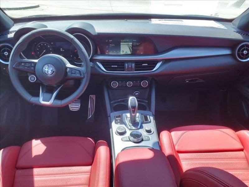 2024 Alfa Romeo Stelvio Ti in a Vesuvio Gray Metallic exterior color and Blackinterior. Northside Imports Houston 281-475-4549 northsideimportshouston.com 