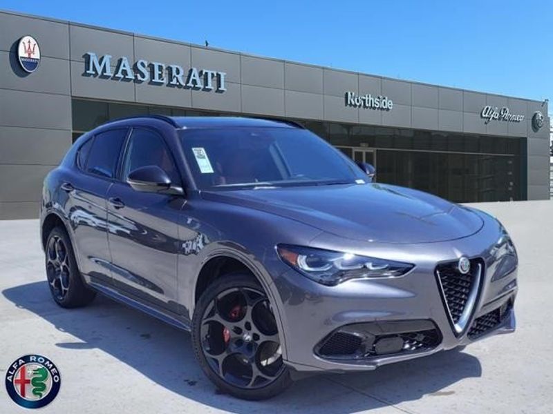 2024 Alfa Romeo Stelvio Ti in a Vesuvio Gray Metallic exterior color and Blackinterior. Northside Imports Houston 281-475-4549 northsideimportshouston.com 