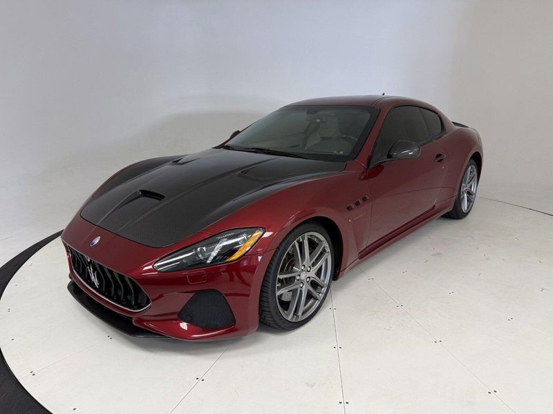 2018 Maserati GranTurismo MC in a Rosso Trionfale Metallic exterior color and Bianco Pregiatointerior. Karma Newport Beach (844) 527-6262 karmanb.com 