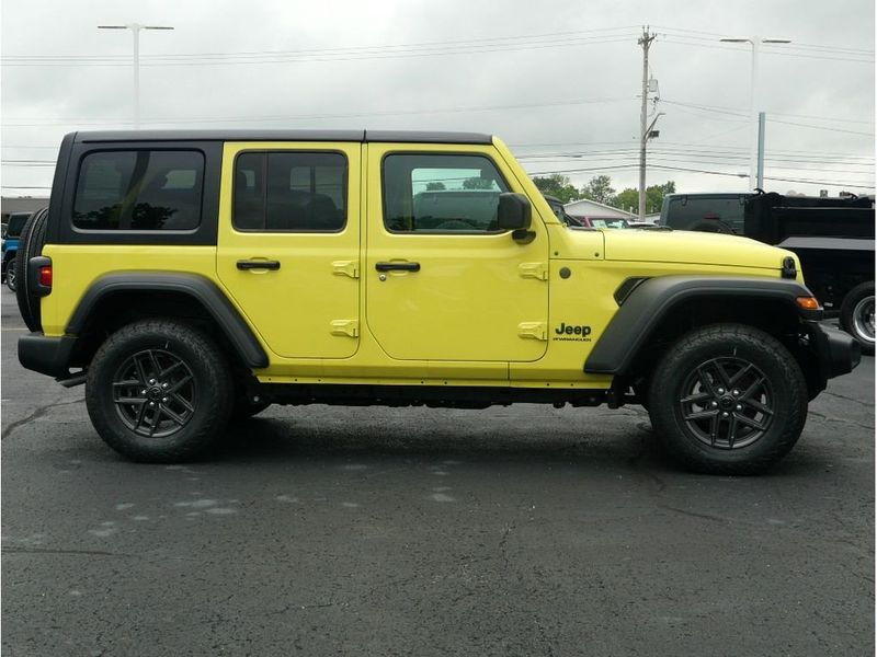 2024 Jeep Wrangler 4-door Sport S in a High Velocity Clear Coat exterior color and Blackinterior. Paul Sherry Chrysler Dodge Jeep RAM (937) 749-7061 sherrychrysler.net 