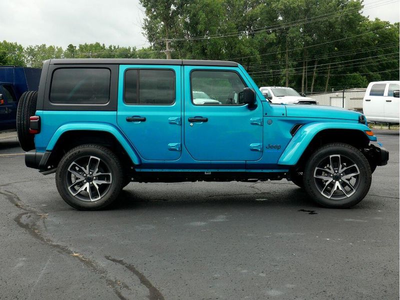 2024 Jeep Wrangler 4-door Sport S 4xe in a Bikini Pearl Coat exterior color and Blackinterior. Paul Sherry Chrysler Dodge Jeep RAM (937) 749-7061 sherrychrysler.net 