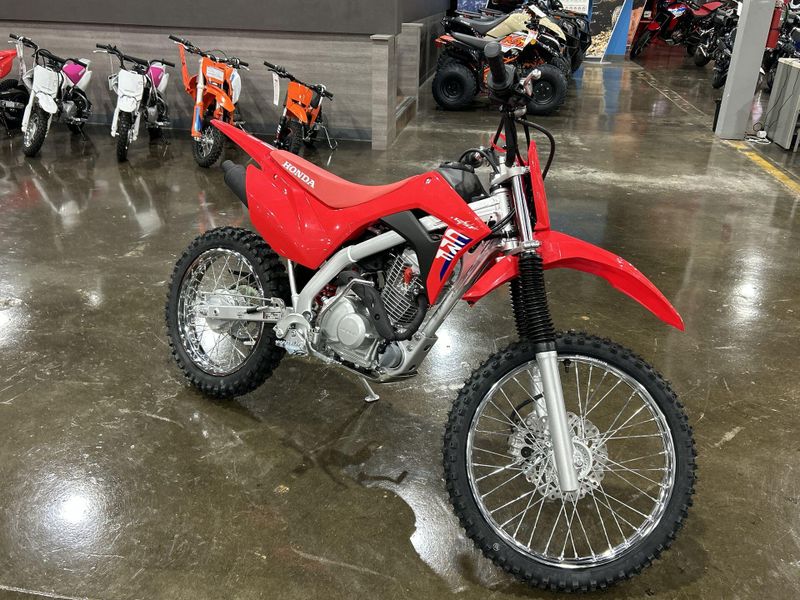 2025 Honda CRF125F BIG WHEEL  in a RED exterior color. Del Amo Motorsports of Redondo Beach (424) 390-7811 delamomotorsports.com 
