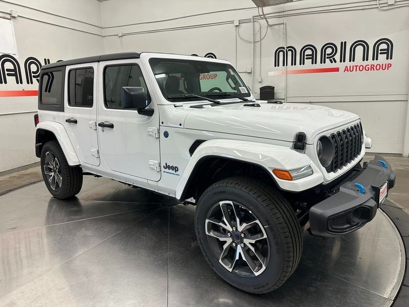 2024 Jeep Wrangler 4-door Sport S 4xe in a Bright White Clear Coat exterior color and Blackinterior. Marina Auto Group (855) 564-8688 marinaautogroup.com 