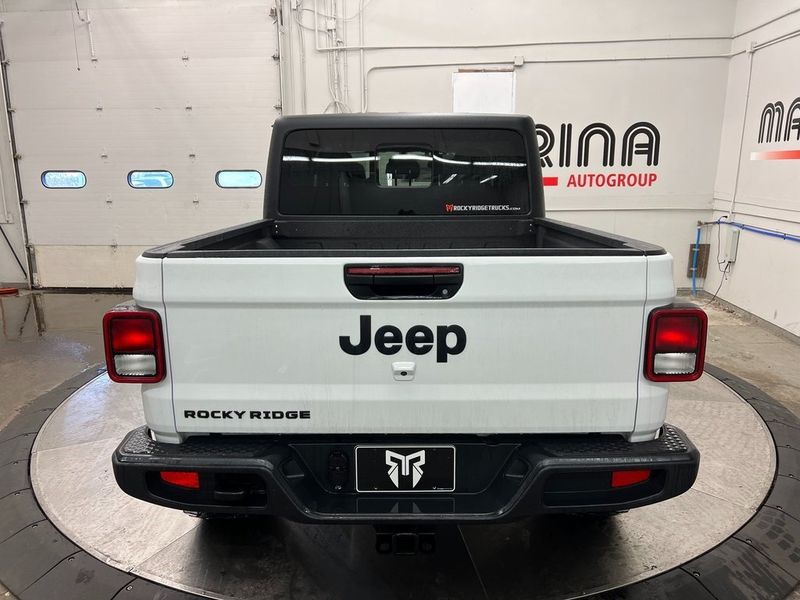 2022 Jeep Gladiator Sport S 4x4 in a Bright White Clear Coat exterior color and Global Black/Steel Grayinterior. Marina Chrysler Dodge Jeep RAM (855) 616-8084 marinadodgeny.com 