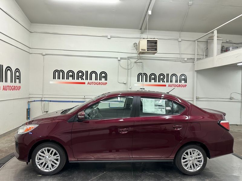 2024 Mitsubishi Mirage G4 SE in a Wine Red Metallic exterior color and Blackinterior. Marina Auto Group (855) 564-8688 marinaautogroup.com 