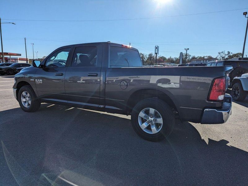 2021 RAM 1500 Classic SLT in a Granite Crystal Metallic Clear Coat exterior color and Diesel Gray/Blackinterior. Johnson Dodge 601-693-6343 pixelmotiondemo.com 