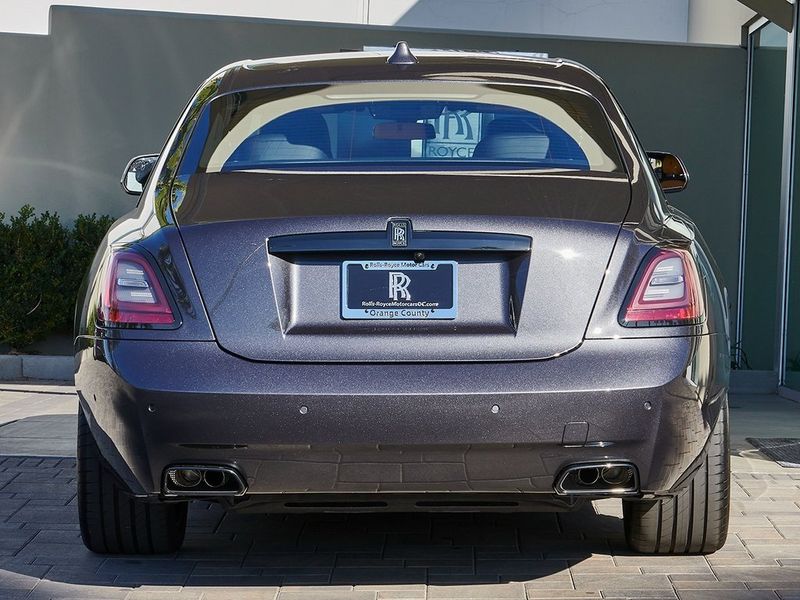 2024 Rolls-Royce Ghost  in a Gunmetal exterior color and Forge Yellowinterior. SHELLY AUTOMOTIVE shellyautomotive.com 