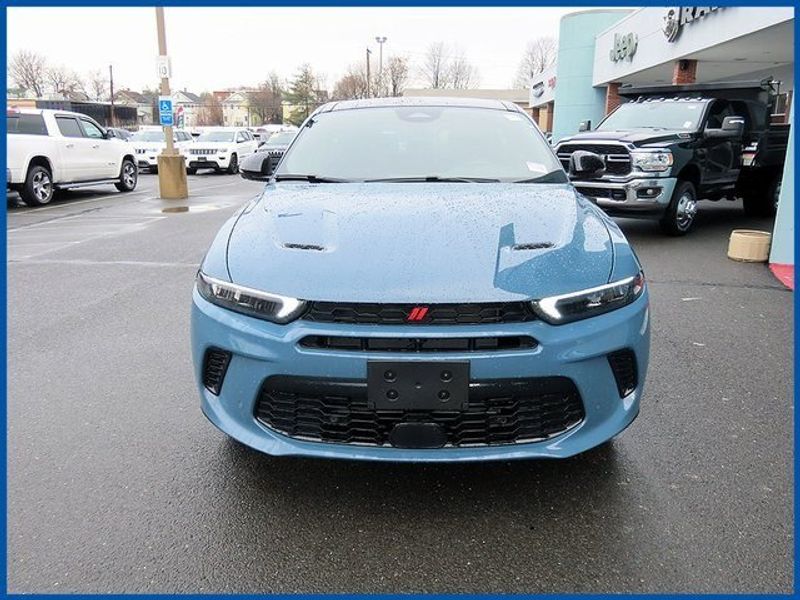 2024 Dodge Hornet R/T Plus in a Blue Steele exterior color and Blackinterior. Papas Jeep Ram In New Britain, CT 860-356-0523 papasjeepram.com 