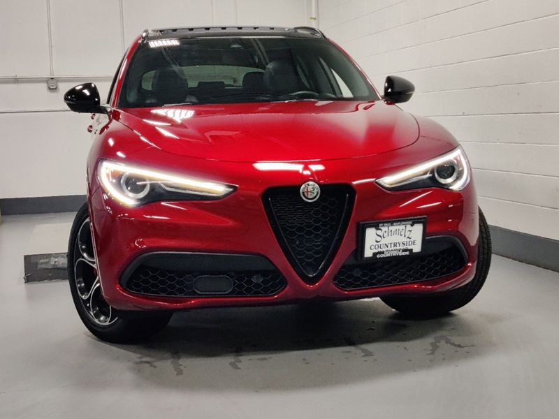 2023 Alfa Romeo Stelvio Veloce Q4 AWD w/Prem & Activ Pkg in a Rosso Etna exterior color and Black Heated Sport Leatherinterior. Schmelz Countryside Alfa Romeo (651) 867-3222 schmelzalfaromeo.com 