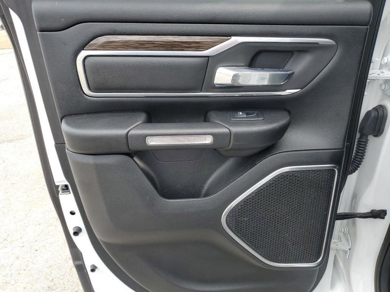 2020 RAM 1500 Laramie in a Bright White Clear Coat exterior color and Blackinterior. Johnson Dodge 601-693-6343 pixelmotiondemo.com 
