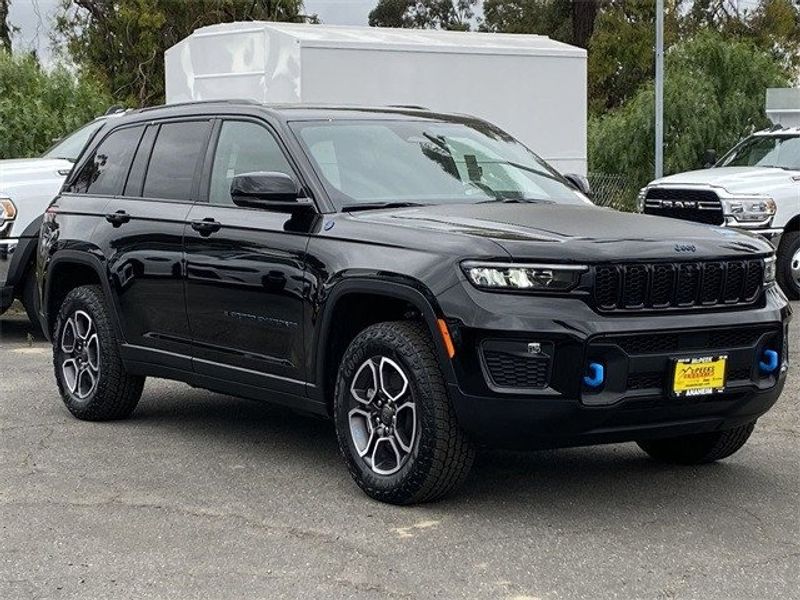 2023 Jeep Grand Cherokee Trailhawk 4xe in a Diamond Black Crystal Pearl Coat exterior color and Global Blackinterior. McPeek