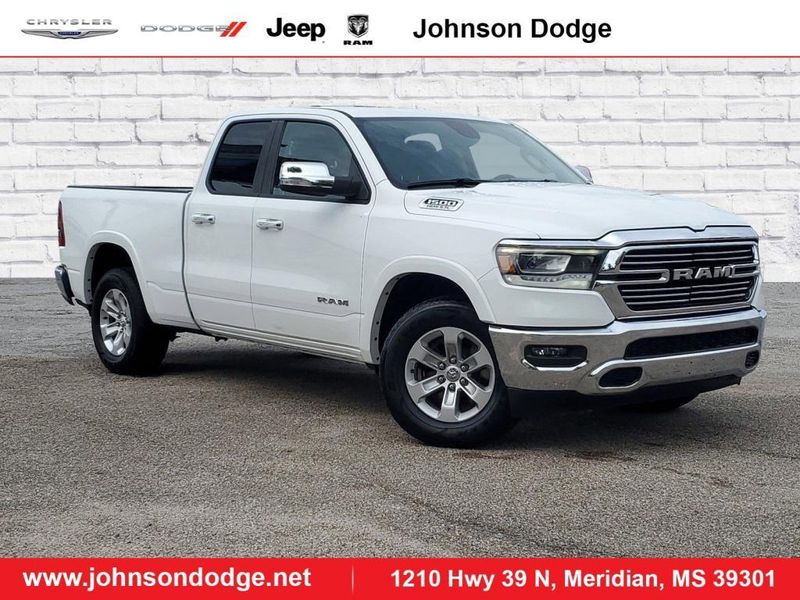 2020 RAM 1500 Laramie in a Bright White Clear Coat exterior color and Blackinterior. Johnson Dodge 601-693-6343 pixelmotiondemo.com 